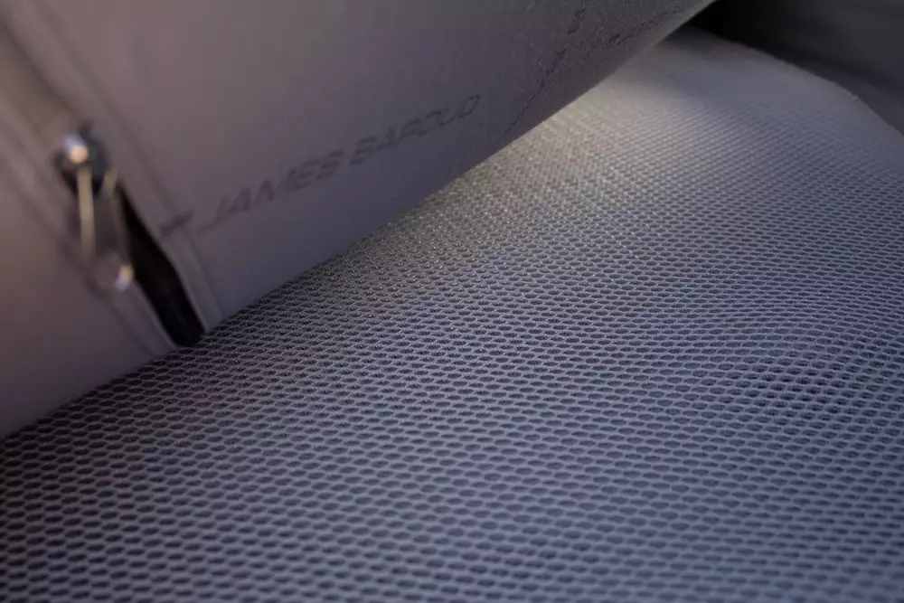 Anti-condensation pad inside a tent below the mattress