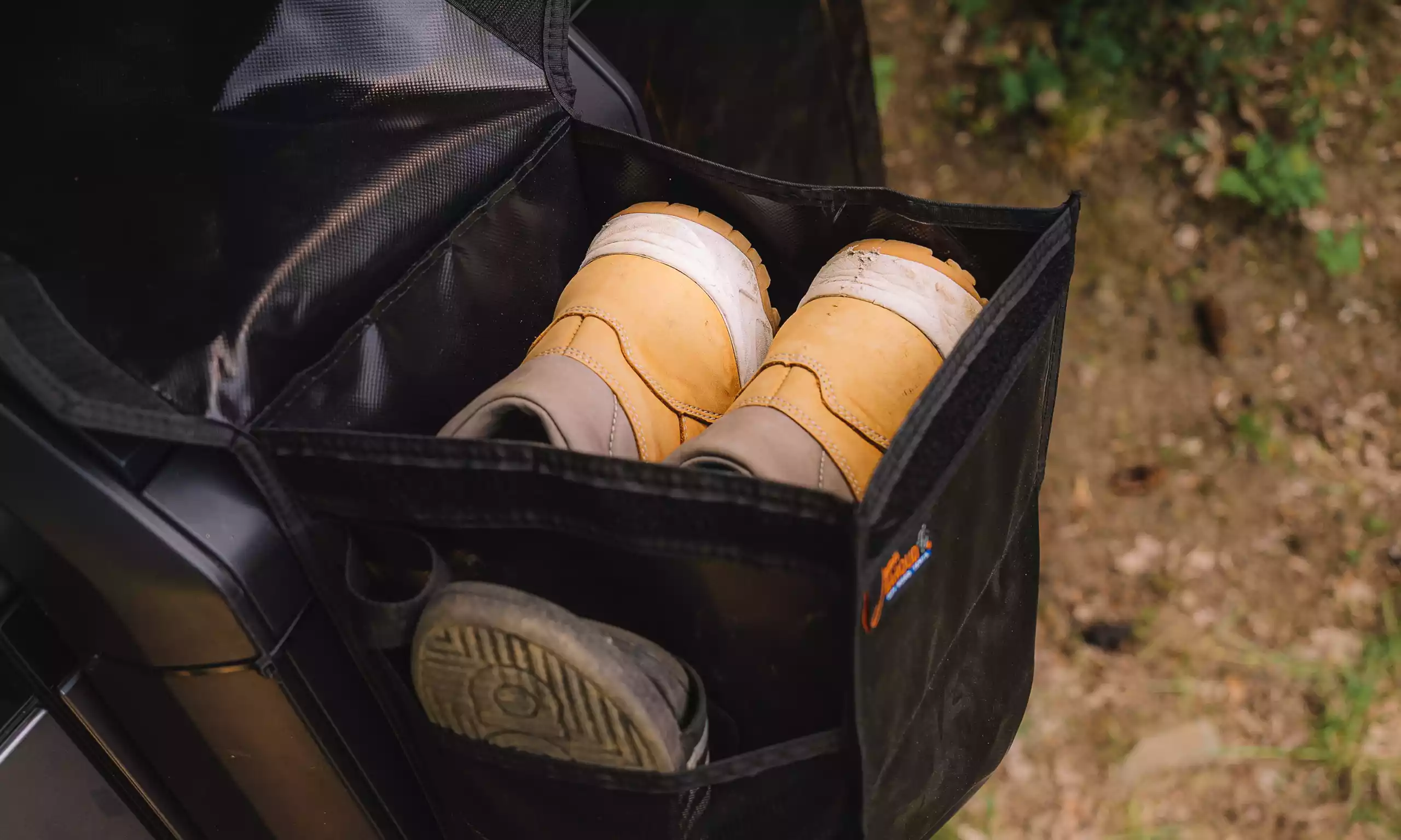 Jakub Fišer showing how he stores his shoes in his James Baroud Adventure Bag