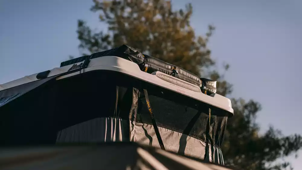 James Baroud Gear Bag on top of Open Grand Raid Rooftop Tent