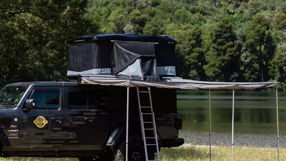 The James Baroud Frontier Tunnel seamlessly connecting the James Baroud Odyssey rooftop tent to the Falcon Awning 270º