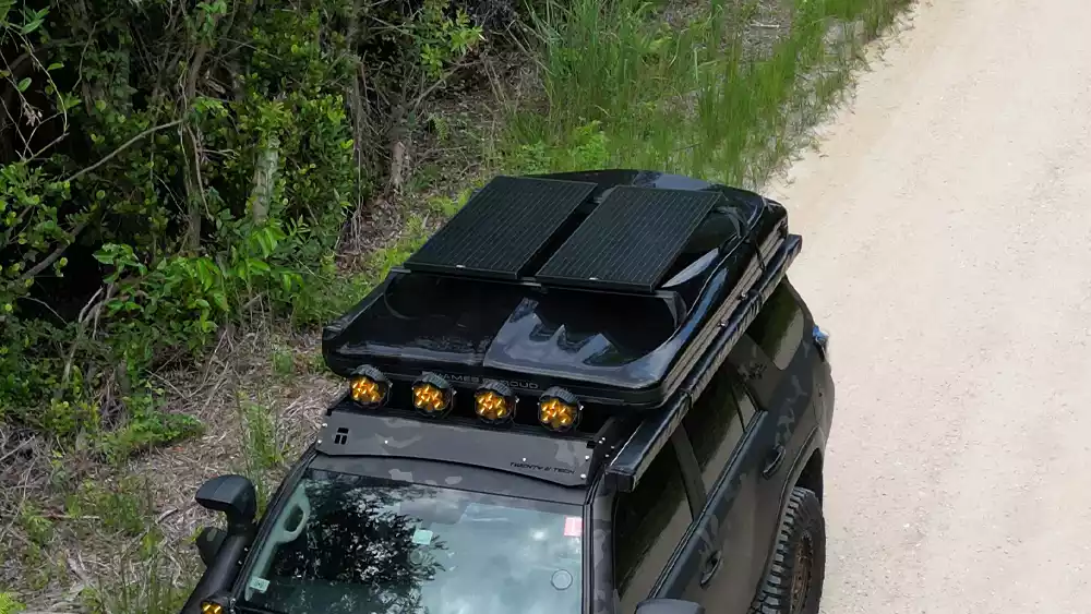 Simon Valero with solar panels attached to the Frontier Cross Bars